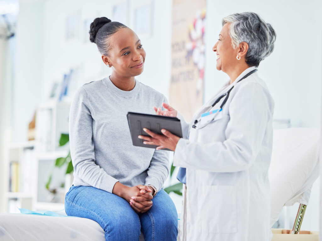 Doctor speaking to patient about their MRI results